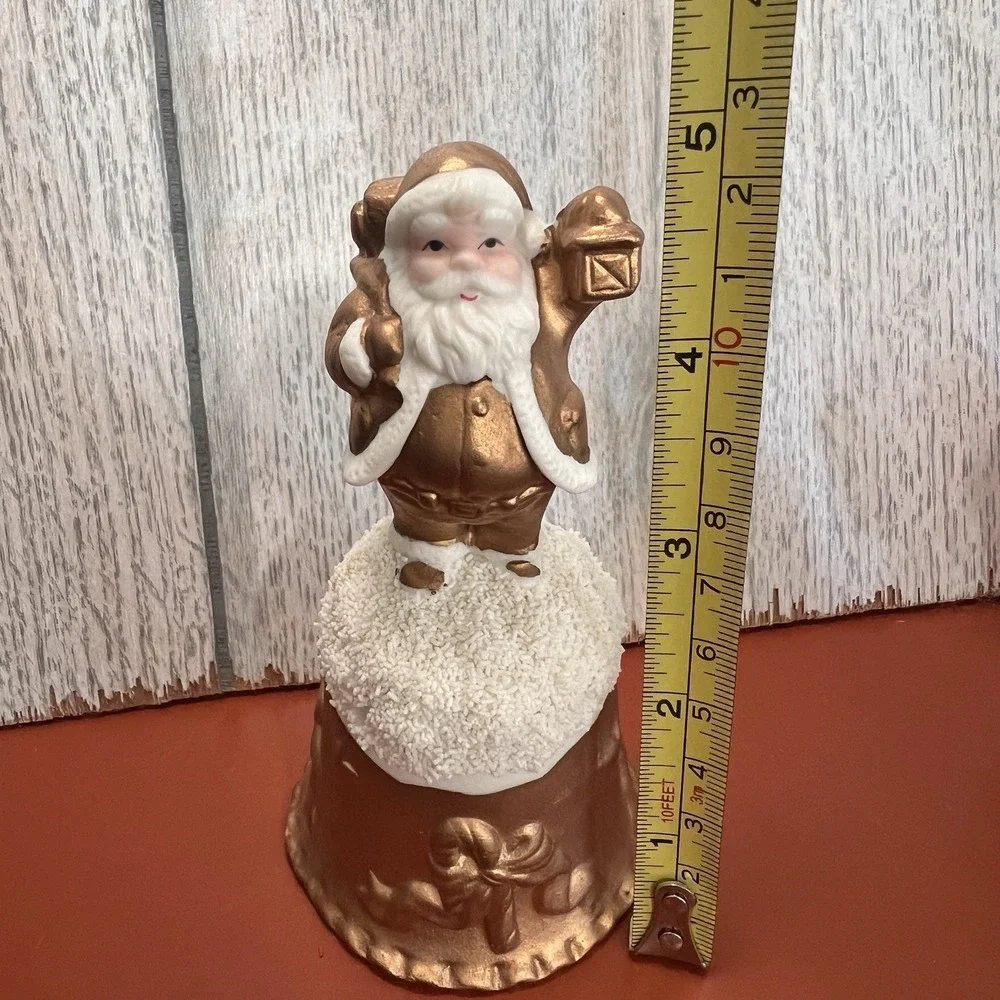 Vintage World Bazaars Inc. Holiday Collection Gold Suited Porcelain Santa‎ Bell